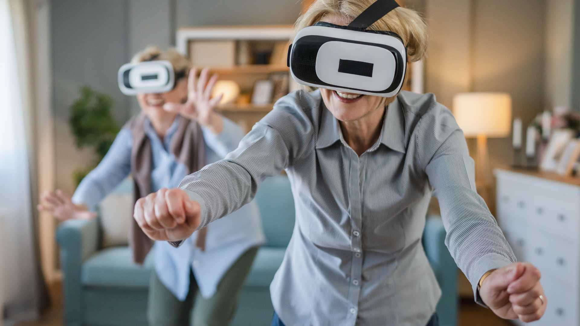 old women using vr headsets disruptive technology